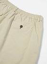 【Universal Works】Pleated Track Short In Stone Paper Touch Cotton 